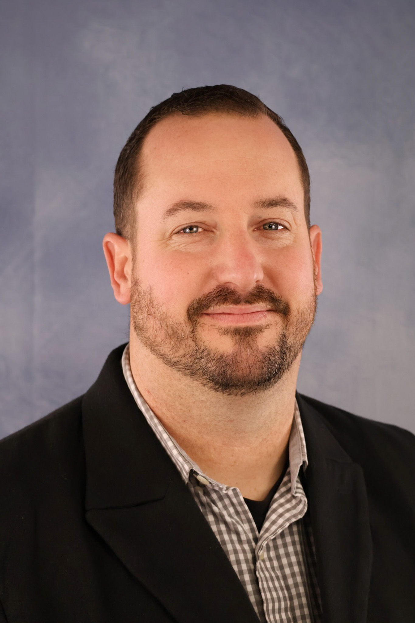 Headshot of Andrew Roberts 