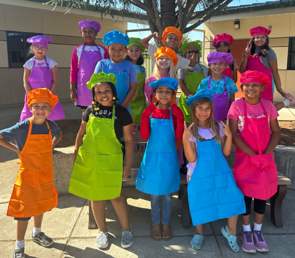 Picture of kids in aprons 